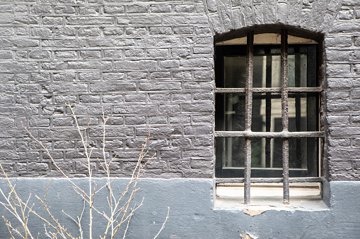 Exterior wall and window to an old building in the city of Amsterdam