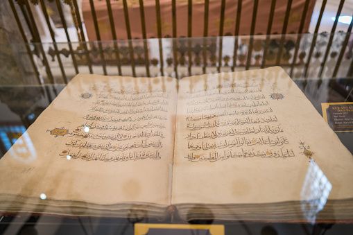 Konya,Turkey:August 3 ,2023 Antique handwritten koran in Mevlana Tomb.Konya