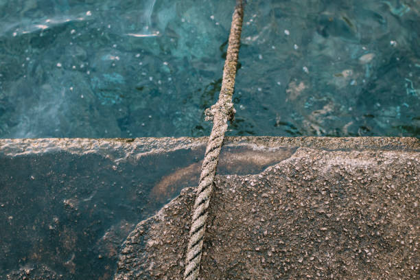 Boat rope in a sea harbor