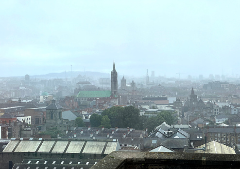View of Dublin cityscape on a cloudy, misty day from Guinness Storehouse