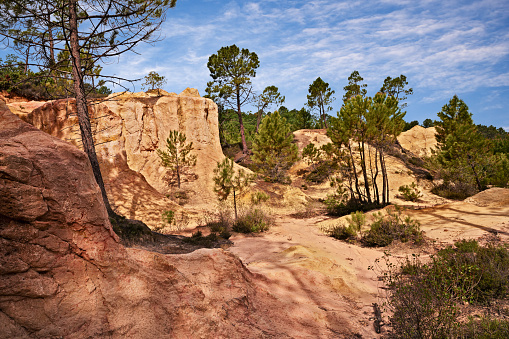 Roussillon, Provence, France: landscape of the characteristic red and yellow ochre rocks in the nature park of Luberon