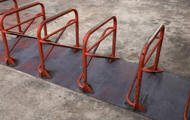 istock The red metal frame of bicycle parking racks 1633986097