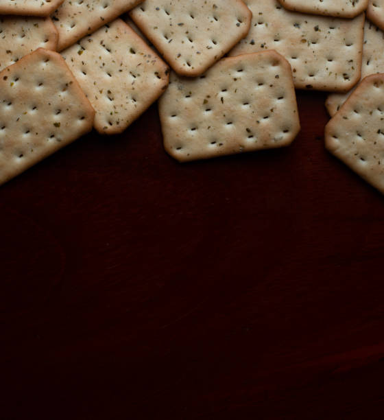 istock Lots of cracker on the hard wood floor 1633989237
