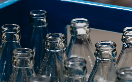 Glass bottles in a plastic crate
