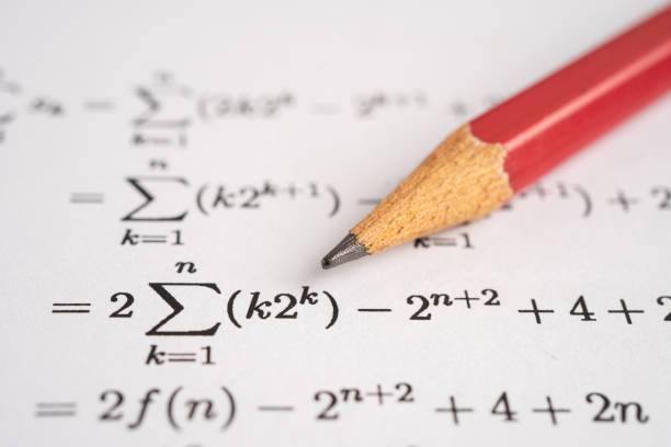 istock Pencil on mathematic formula exercise test paper in education school. 1633998697