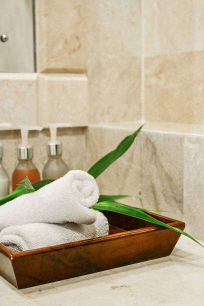 istock Stack of towels with a soap dispenser 1634000567