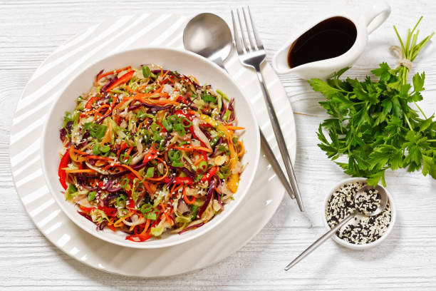 istock asian slaw, crunchy oriental cabbage salad in bowl 1634001098
