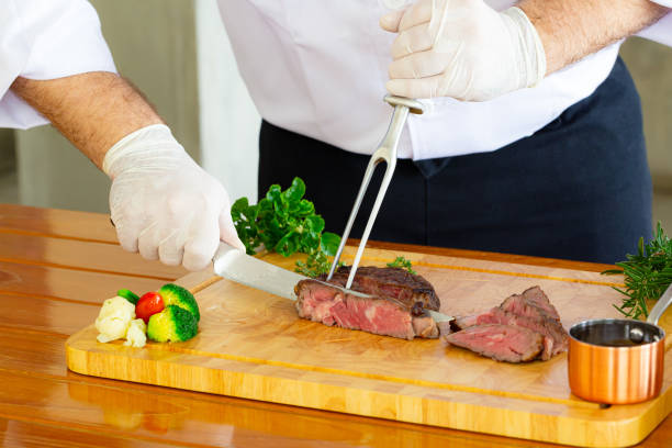 istock Beef steak and human hands,Be sure to have them ready in the restaurant. 1634021328