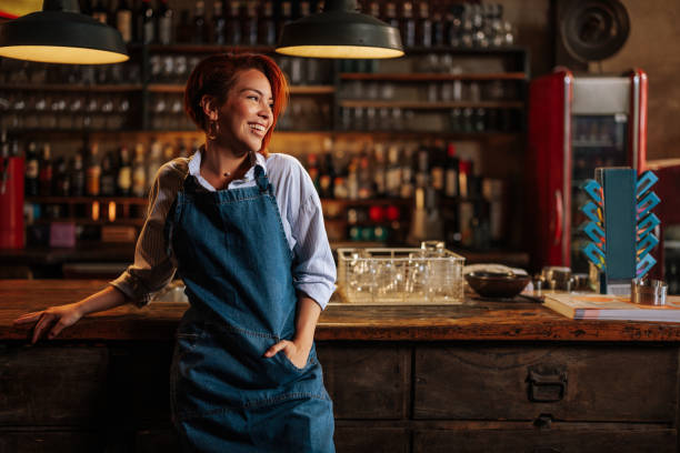 Horizontal portrait of beautiful young Hispanic waitress.