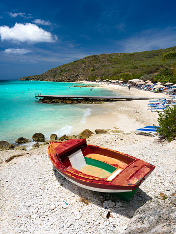 Old boat and shoreline of Playa PortoMari, Curacao