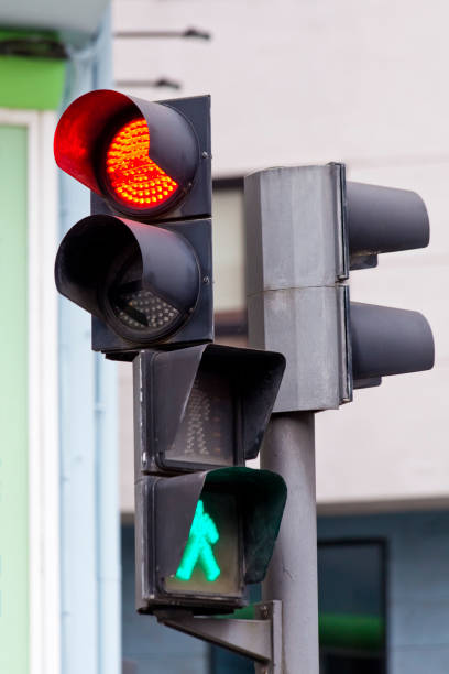 istock Red traffic light, green pedestrian light. 1634054248