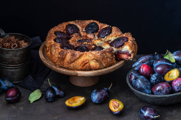 istock Delicious homemade plum cake on a dark background 1634072492
