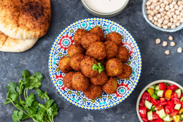 istock Vegetarian dish - falafel balls from spiced chickpeas 1634073020