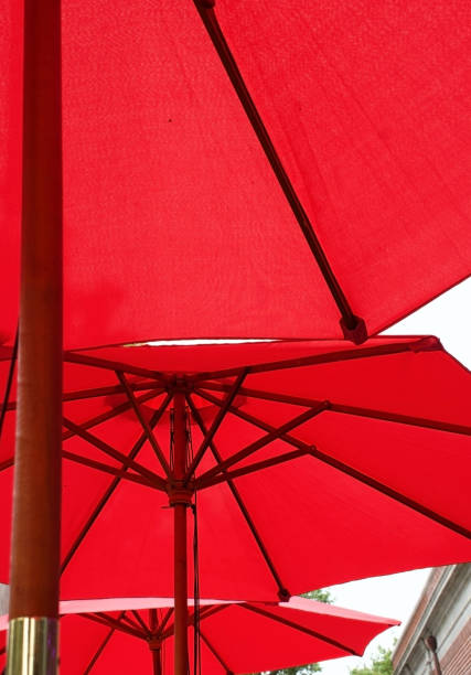 istock bright red umbrella pattern offering shade and protection with outdoor style and design 1634084709