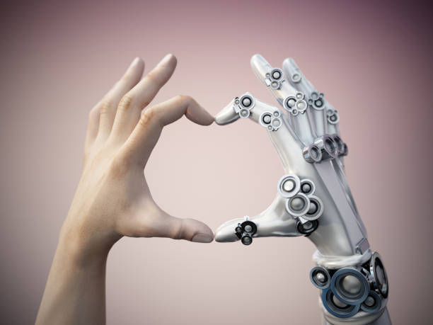 人間とロボットの手が一緒にハートの形をします。AIと人間のコラボレーションのコンセプト