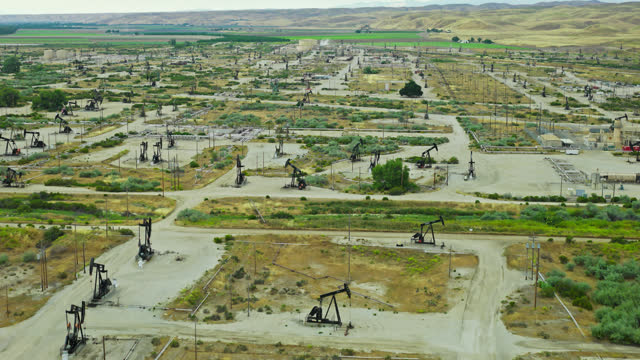 Establishing Shot of Pumpjacks in a California Oil Field