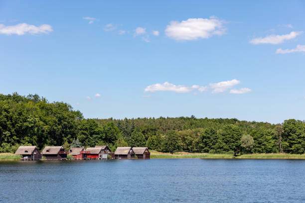 typical boathouses in the Mecklenburg Lake District, Germany