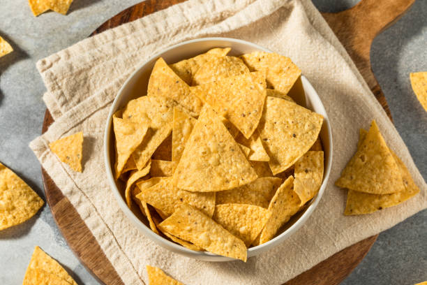 homemade triangle tortilla corn chips - tortilla chip imagens e fotografias de stock