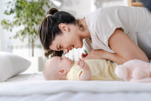 istock Mom and daughter playing at home 1634179617