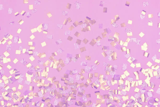 istock square gold holiday sequins on light pink background 1634209851