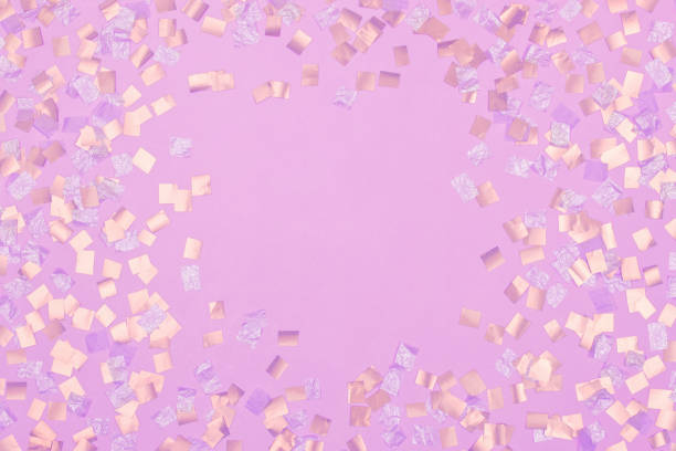 istock square gold holiday sequins on light pink background 1634209853