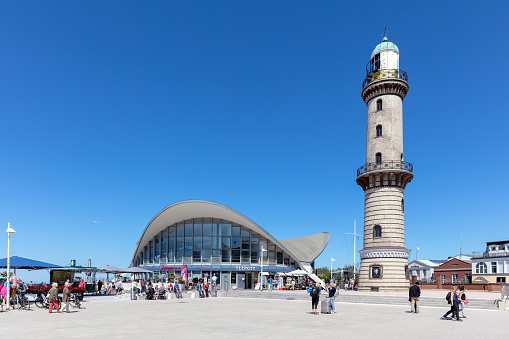 Rostock, Germany - June 15, 2020: Warnemünde Lighthouse. It has a height of 36.9 metres (121 ft) and was put into service in 1898.