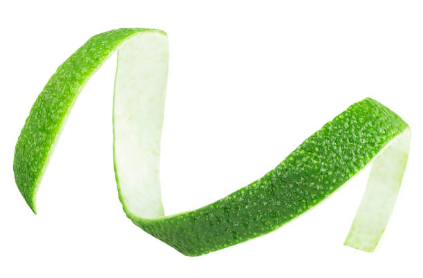 istock Peel of fresh lime fruit isolated on a white background. Lime zest. 1634261204