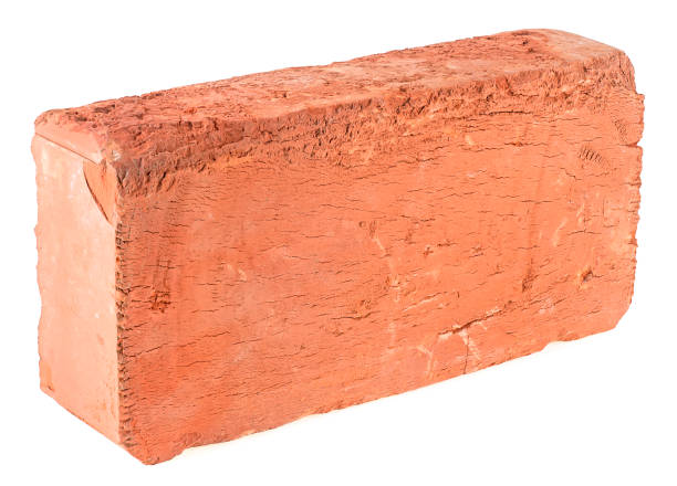 istock Old red brick isolated on a white background. Single red clay rough brick. 1634261206