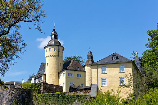 Nümbrecht, Germany - MAy 16, 2020: Homburg Castle, an old hill castle in Nümbrecht, Oberbergischer Kreis in the German state of North Rhine-Westphalia.
