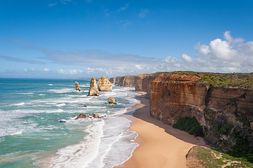 Afternoon view of high cliffs of the Twelve Apostles, located at the Great Ocean Road, Victoria, Australia