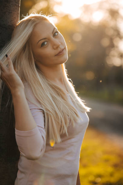 istock Young woman enjoying autumn nature 1634308135