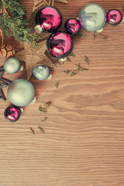 istock Shiny pink baubles, New Year tree branches and stars 1634352242