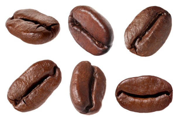 istock Aromatic roasted coffee beans isolated on white 1634365134