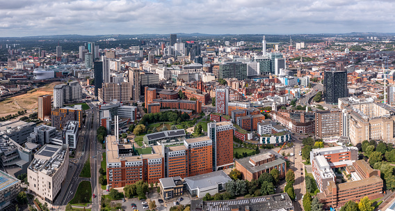 Birmingham , UK - August 21, 2023.  An aerial panoramic view of a Birmingham cityscape skyline with modern buildings and skyscrapers