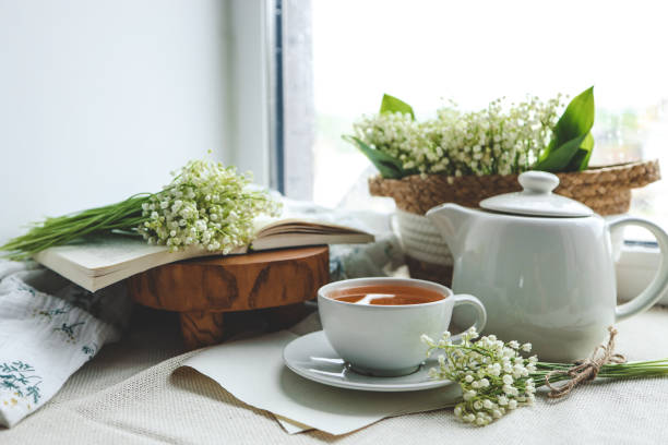 istock Cup of hot tea and spring home interior. good morning concept 1634448653