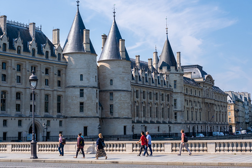 Paris, FR - 31 August 2022: Facade of Conciergerie Castle