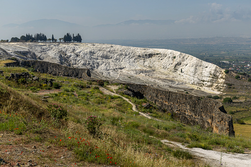 Travertine terraces made from the hot springs at Pamukkale National Park, leaving deposits of calcium. Pamukkale means cotton castle in Turkish and is in the province of Denizli in southwestern Turkey.