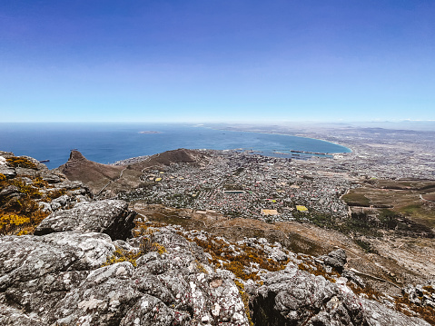 Hiker's view from top of the Table Mountain with the Lion's Head on the left-hand side, Cape Town, South Africa
