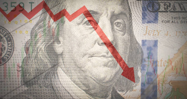 istock One hundred dollar bill on the background red downward arrow. Economic crisis. 1634647849
