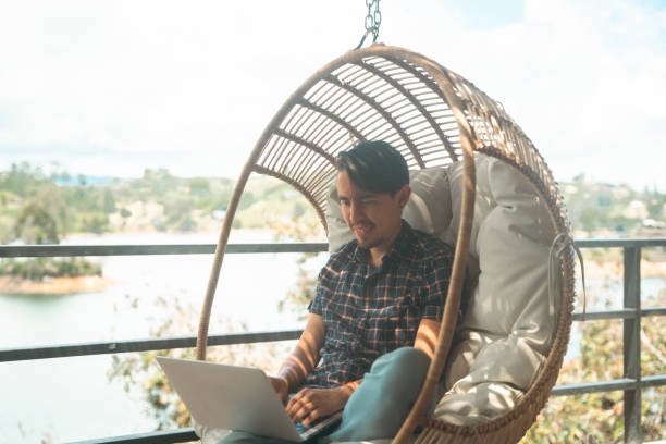 istock A Young man working remotely while traveling with his dog living a nomadic lifestyle 1634648869