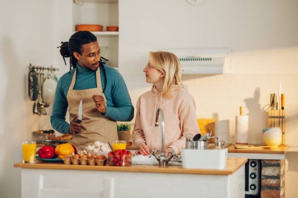 istock A multiethnic couple is cooking together at home. 1634689061