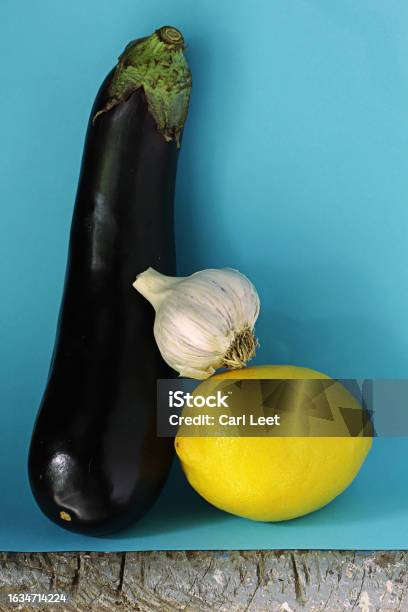 Eggplant And Things That Go With It Stock Photo - Download Image Now - Color Image, Eggplant, Garlic