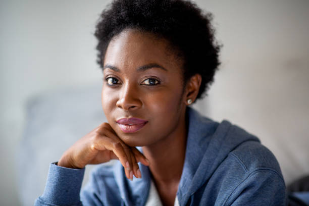 istock Close up young black woman looking at camera 1634747794