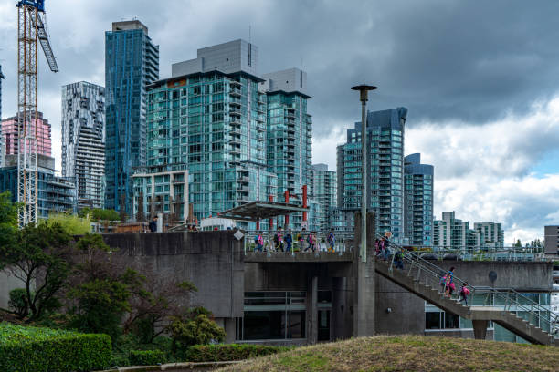 Vancouver, British Columbia - July 25, 2023: The view of Coal Harbour seaside park, Vancouver, Canada.