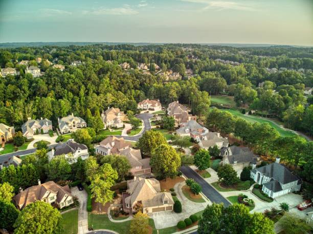 Panoramic aerial view of a beautiful subdivision in an upscale neighborhood in Georgia, USA shot during golden hour