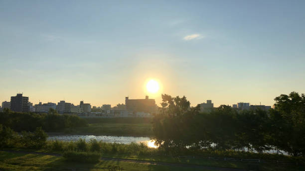 istock Morning sun and streetscape along the river 1634938375