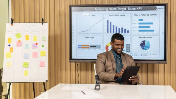istock Confident man leads, showcasing leadership, strategic thinking, overseeing operations with laptop 1634955942