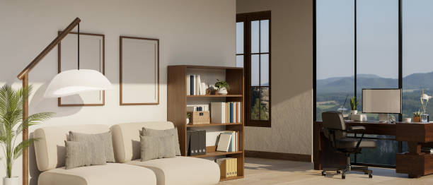 istock A comfortable living room with a work table against a large glass window with nature view 1634999080