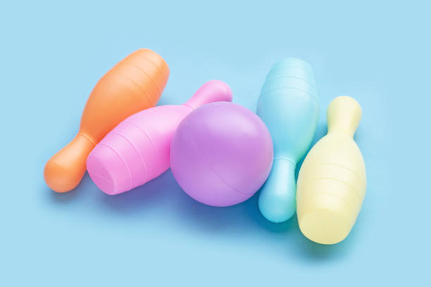 istock Colorful plastic bowling toy on blue background. 1635000138