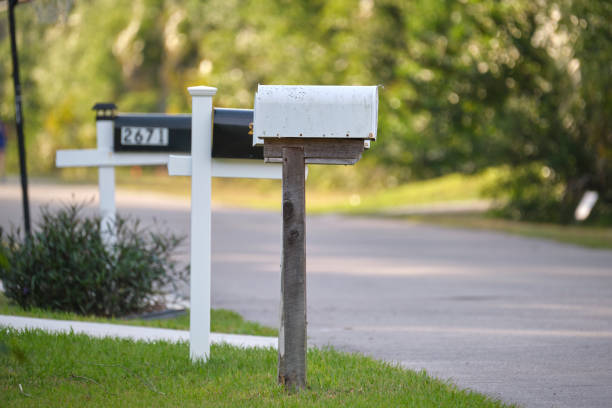 istock Typical american outdoors mail box on suburban street side 1635044389